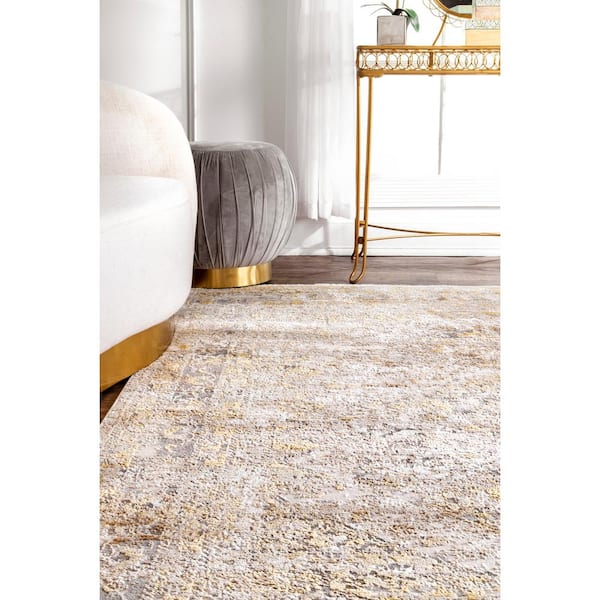 Shaunte Faded Vintage 8 ft. x 10 ft. Gold Area Rug