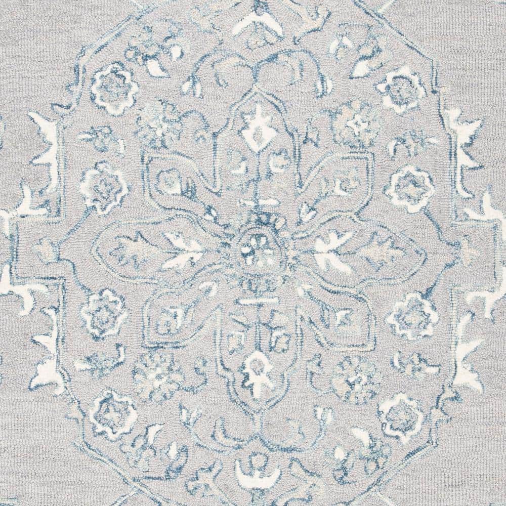 Light Grey and Ivory Wool Tufted 4' x 6' Area Rug
