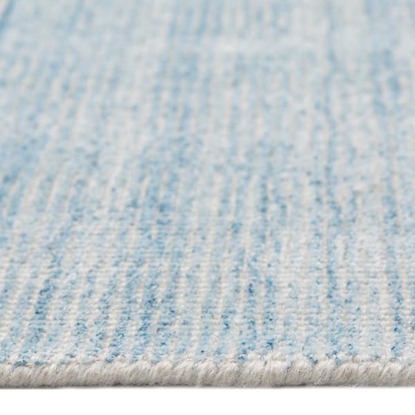 https://images.thdstatic.com/productImages/ed3daa48-24ee-44cd-a80a-4a0726cbba55/svn/light-blue-solo-rugs-area-rugs-s1109-05000800-blue-e1_600.jpg