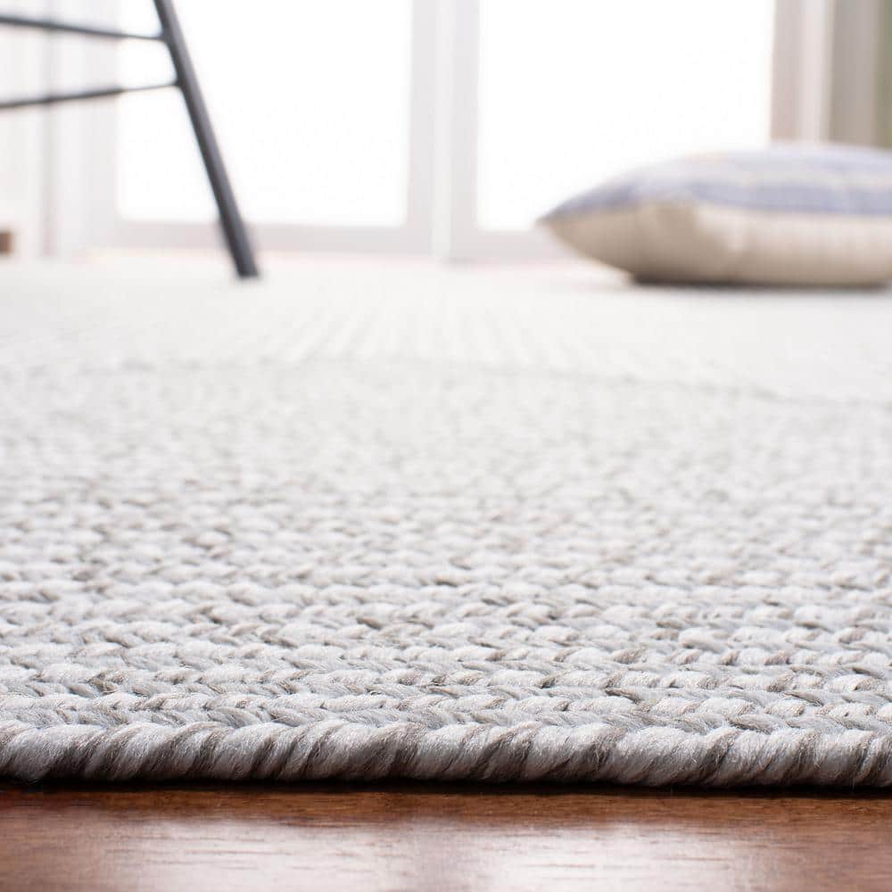 https://images.thdstatic.com/productImages/ed4b38fb-7a0e-4fe7-a0b0-842427efdb77/svn/silver-gray-safavieh-area-rugs-brd315f-3r-4f_1000.jpg