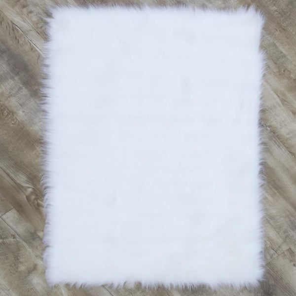 Home Decorators Collection Faux SheepSkin White 4 ft. x 6 ft. Area Rug