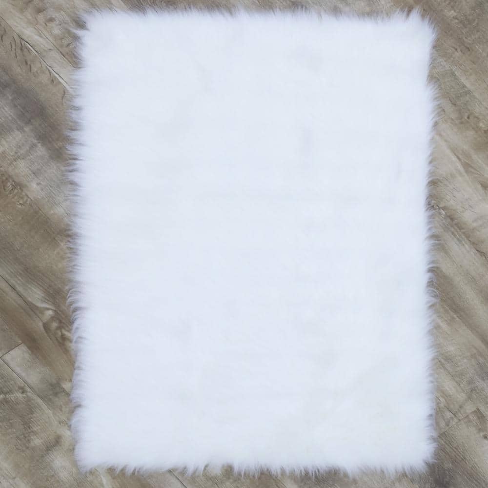 Faux SheepSkin White 5 ft. x 8 ft. Area Rug price history on PriceWatchPro
