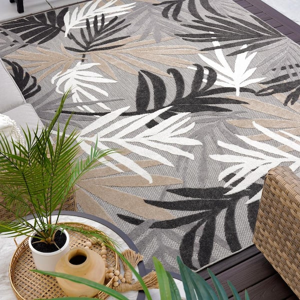 https://images.thdstatic.com/productImages/ed671b12-040a-4824-bd73-a2403ab9160c/svn/gray-tayse-rugs-outdoor-rugs-oas1009-9x12-44_600.jpg