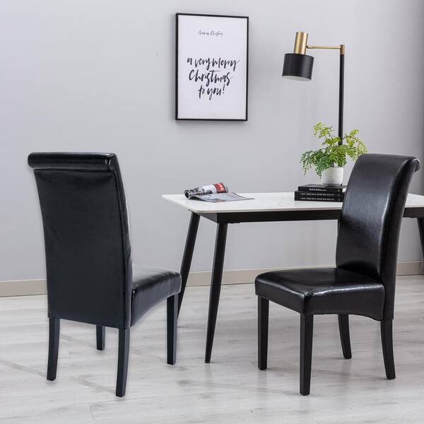 black leather dining chairs with wooden legs