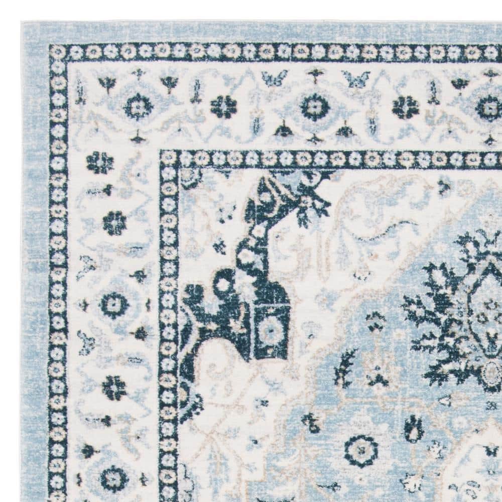 Isabella Light Blue and Cream 8' x 10' Synthetic Area Rug