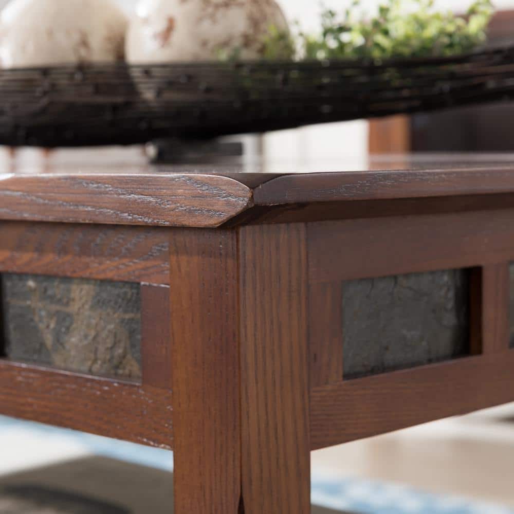 Close-up of the corner and slate tile detail of the rustic oak coffee table.