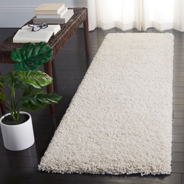 Evolution Shag 2 ft. x 8 ft. Ivory Solid Runner Rug