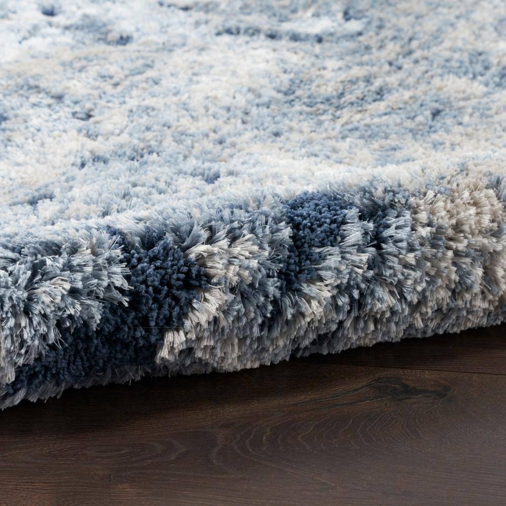 Light Blue Abstract Shag 5' x 7' Synthetic Area Rug