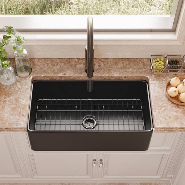 https://images.thdstatic.com/productImages/eda5d489-fead-4c1d-9a29-6046bf4f9b85/svn/black-tobili-farmhouse-kitchen-sinks-hkd-331810-b-a0_600.jpg