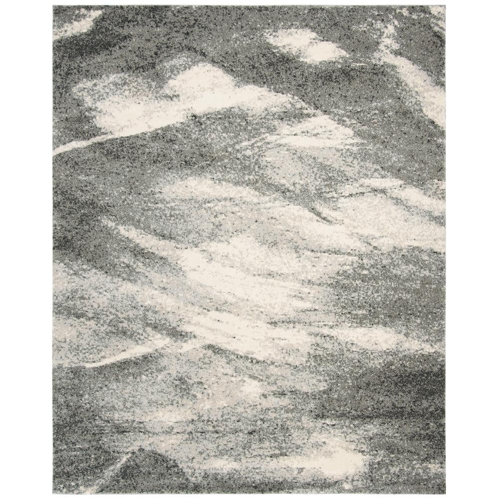 Grey and Ivory Abstract Synthetic Area Rug