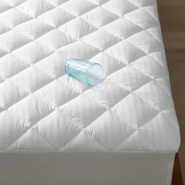 https://images.thdstatic.com/productImages/edc568b6-e9c3-40b9-930a-2c888d5e4424/svn/the-company-store-mattress-pads-11108c-q-white-4f_600.jpg