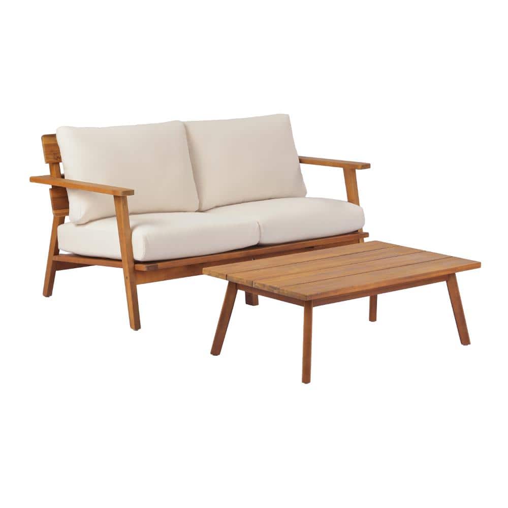 Mid-century modern patio loveseat and coffee table set on a white background.