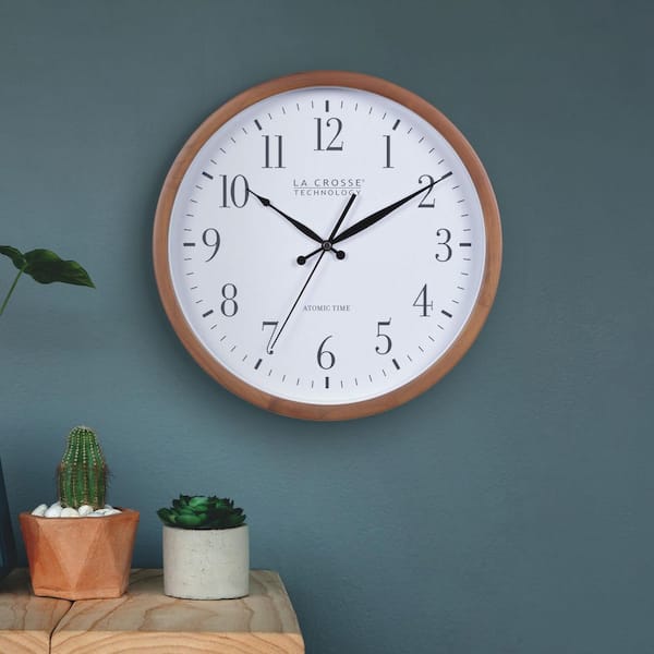 https://images.thdstatic.com/productImages/edcac745-fff5-450d-8e3e-e0024ce5bf61/svn/walnut-la-crosse-technology-wall-clocks-404-50447-int-31_600.jpg