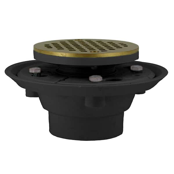 JONES STEPHENS 2 in. x 3 in. PVC Shower Drain/Floor Drain, 4 in. Polished Brass Cast Round Strainer-Fits Over 2 in. Sch. 40 DWV Pipe