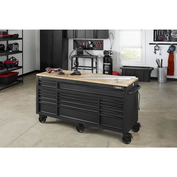 https://images.thdstatic.com/productImages/eddf106e-b6ce-4f6e-a34f-b9a1573c1711/svn/matte-black-with-black-trim-husky-mobile-workbenches-holc7218bb1mys-a0_600.jpg