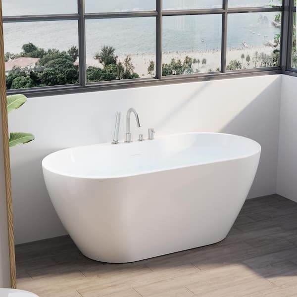 57 in. x 29.5 in. Freestanding Soaking Bathtub with Center Drain in White with Built-In Widened Deck for Storage