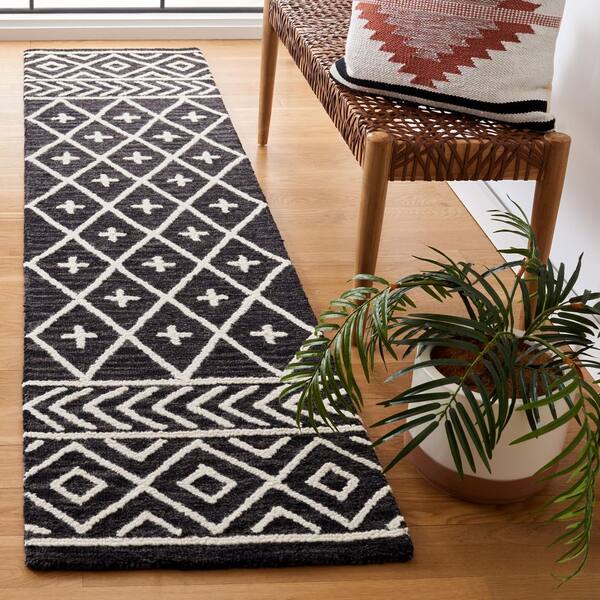 Metro 2 ft. x 9 ft. Black/Ivory Tribal Runner Rug
