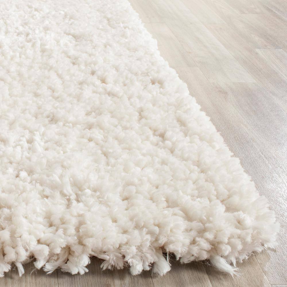 Ivory Handmade Tufted Shag Area Rug, 8' x 10'