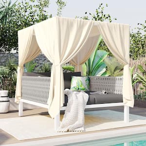 White Metal and Rubber Core Rope Outdoor Day Bed with Beige Curtains and Gray Cushions