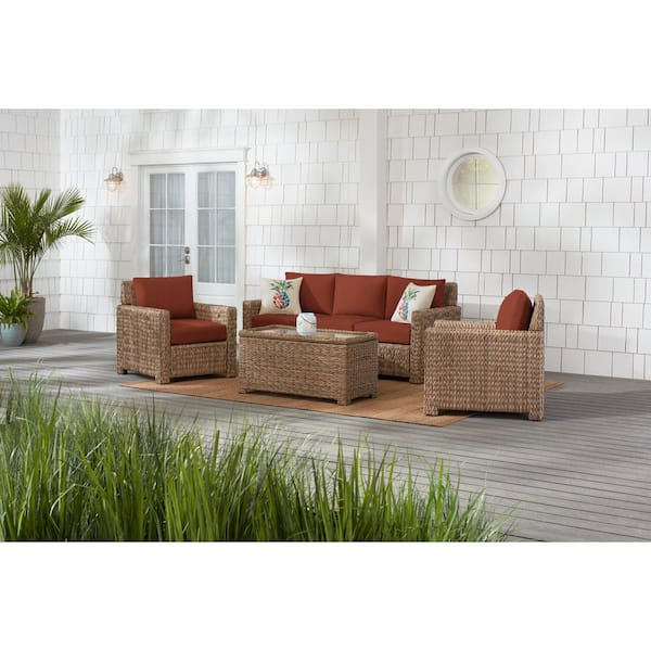 Hampton Bay Laguna Point 4-Piece Natural Tan Wicker Outdoor Patio Conversation Seating Set with CushionGuard Quarry Red Cushions