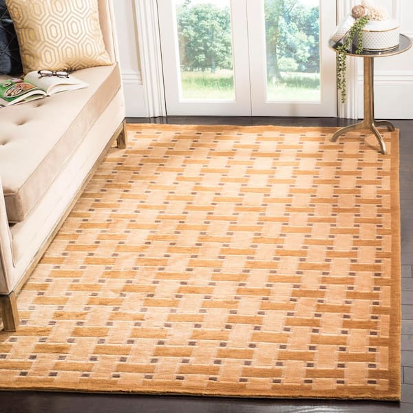 Tibetan 5 ft. x 8 ft. Peach Geometric Area Rug
