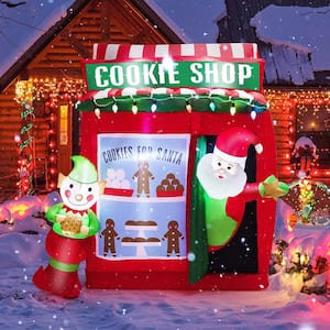 6.3 ft. H x 5.3 ft. Self Inflatable Santa Claus Cookie Shop Christmas Decoration with Colorful Lights