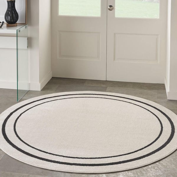 Nourison Essentials Ivory/Black 8 ft. x 8 ft. Solid Contemporary Round Area Rug