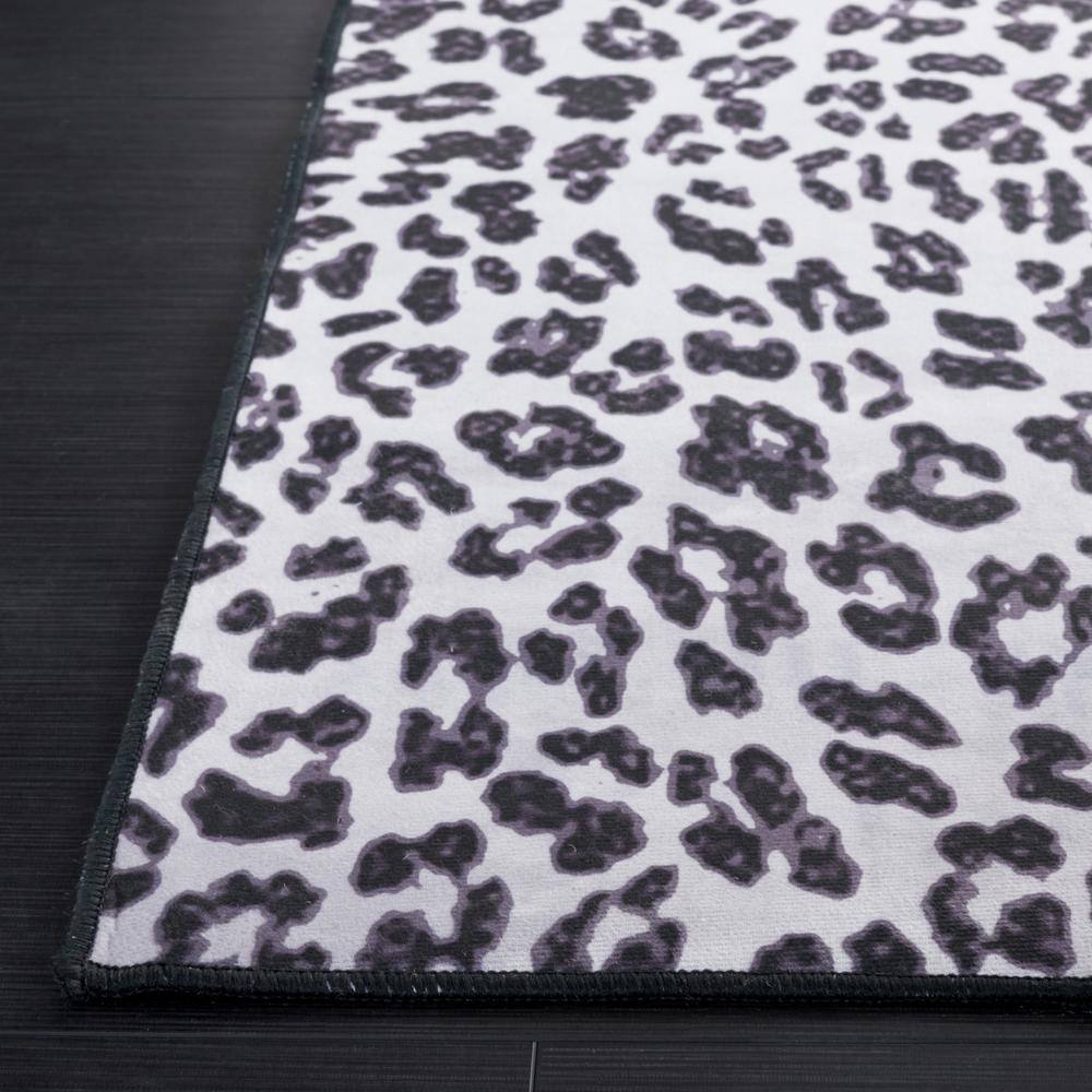Black and Ivory Faux Fur Animal Print Washable Rug