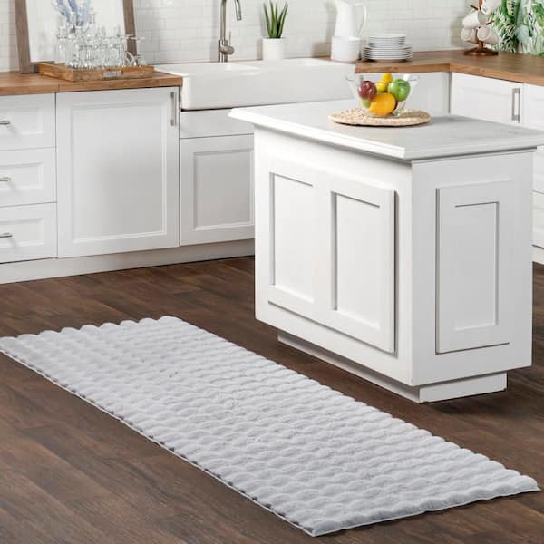 Jeni Solid Faux Rabbit Machine Washable 2 ft. 6 in. x 10 ft. Green  Runner Rug