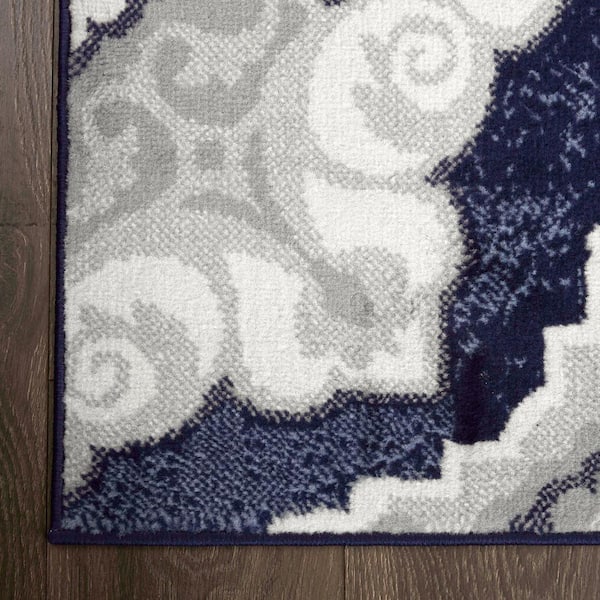 https://images.thdstatic.com/productImages/ee5cf579-d526-4e1b-8da5-828ae3e174ff/svn/navy-blue-ivory-home-dynamix-area-rugs-2n-hd5145-300-c3_600.jpg