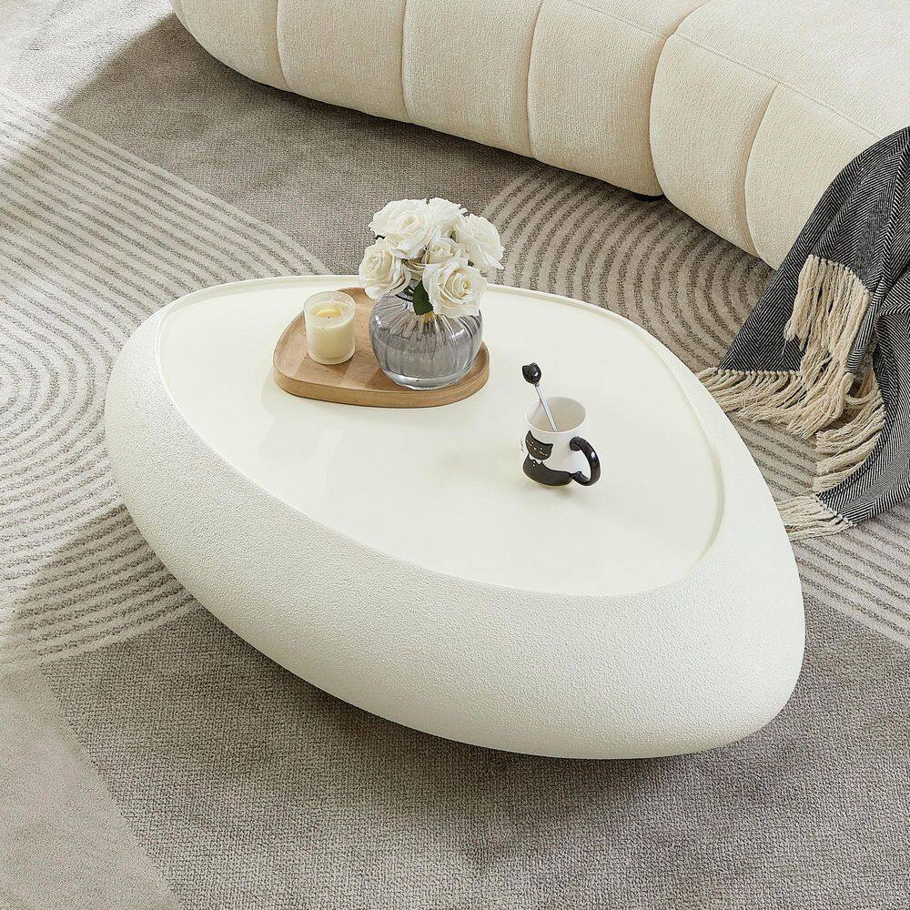 Lapis 47.24 in. W White Oval Glass Fibre Elliptical Coffee Table, Faux Matte Rocks Table