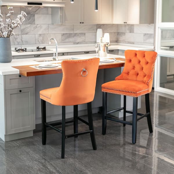 orange wooden bar stools