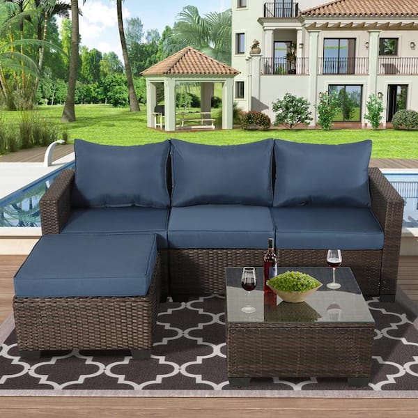 Brown 5-Piece Wicker Outdoor Sectional Set with Dark Blue Cushions and Coffee Table