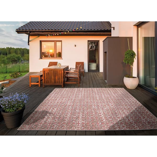 https://images.thdstatic.com/productImages/ee6fff9a-532b-459f-bc6a-9cc043d31c95/svn/rust-outdoor-rugs-87307-c3_600.jpg