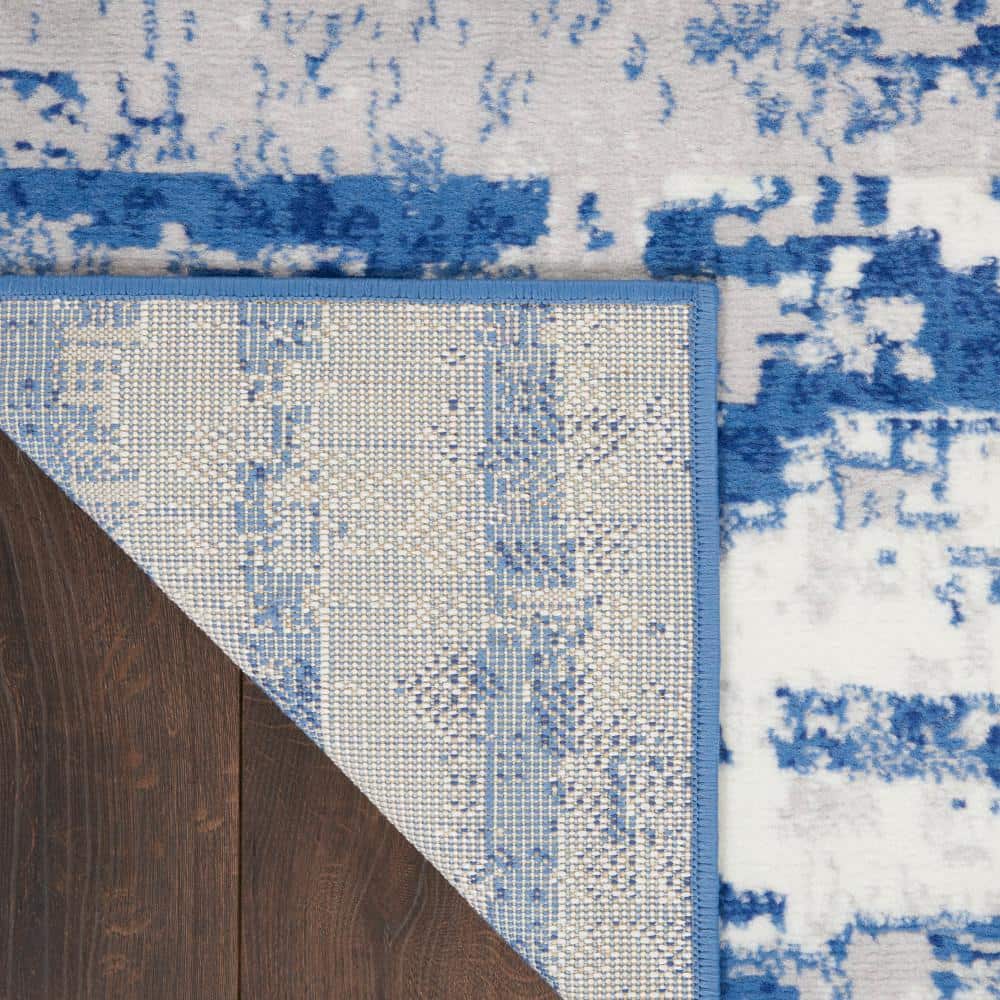 Ivory and Navy Abstract Synthetic Runner Rug
