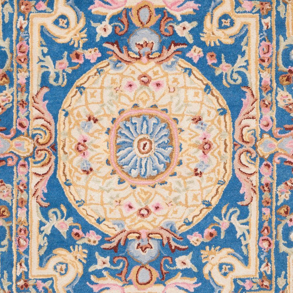 Hand-Tufted Blue and Ivory Wool Rectangular Area Rug, 4' x 6'