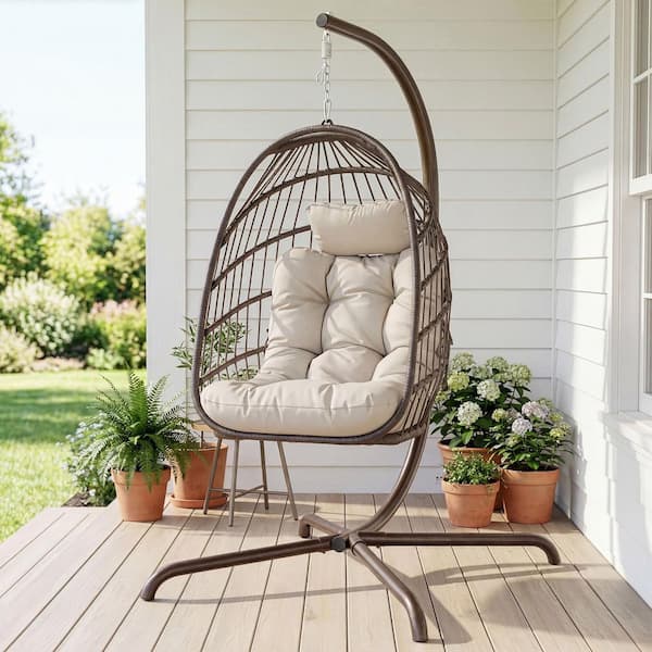 Outdoor Foldable Brown Wicker Egg Porch Swing Chair with Steel Stand and Beige Cushion for Patio