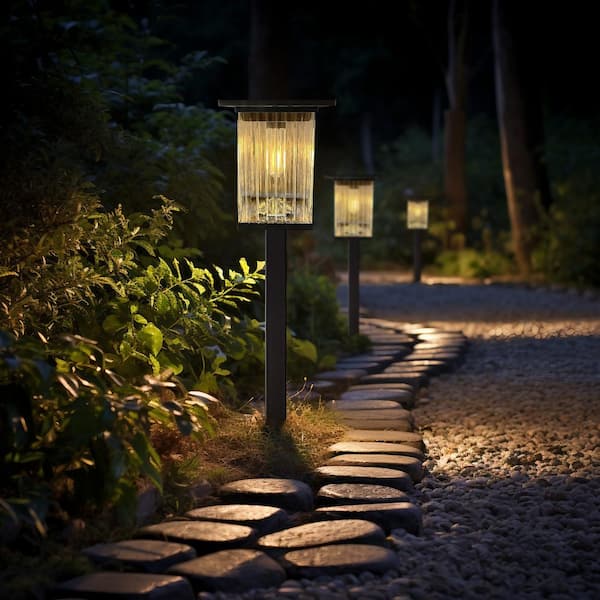 Black Integrated LED Outdoor Solar Pathway Lights with Clear Ribbed Glass (4-Pack)