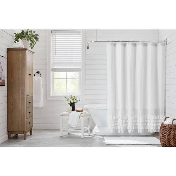 https://images.thdstatic.com/productImages/ee94eaf2-8a59-4e54-b26a-25fe77f05ea8/svn/white-ruffle-home-decorators-collection-shower-curtains-ruf-sc-72-1d_600.jpg