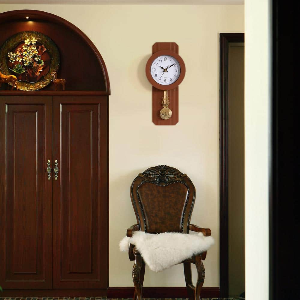 Vintage Brown and Gold Plastic Pendulum Wall Clock