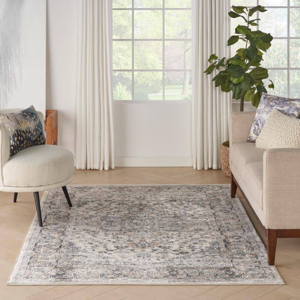 Ivory and Grey Synthetic 5' x 7' Reversible Area Rug