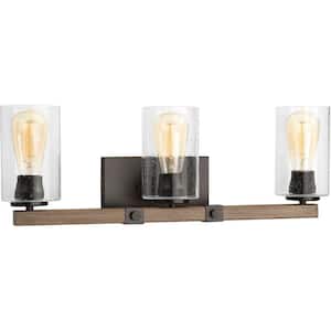 Barnes Mill Collection 24 in. 3-Light Antique Bronze Clear Seeded Glass Farmhouse Bathroom Vanity Light