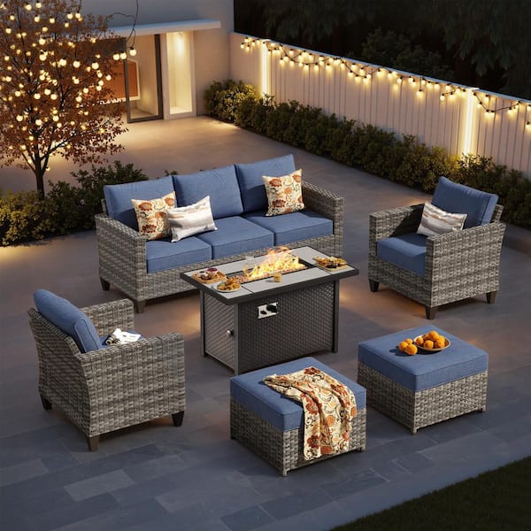 Camden Gray 7 Pieces Wicker Patio Conversation Set with 42 in. 50000 BTU Fire Pit Table, Denim Blue Cushions and Ottoman