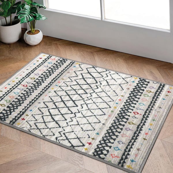 https://images.thdstatic.com/productImages/eef3a336-9dc6-46ce-9f87-a5496248521f/svn/6062-off-white-ottomanson-area-rugs-oth6062-2x3-31_600.jpg