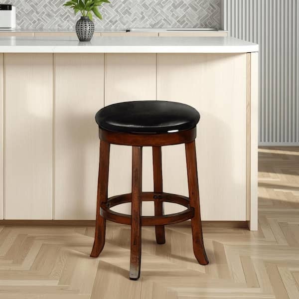 Benjara Reggie Swivel Black and Brown Wood Frame Counter Stool Reggie Swivel with Cushion (Set of 2)