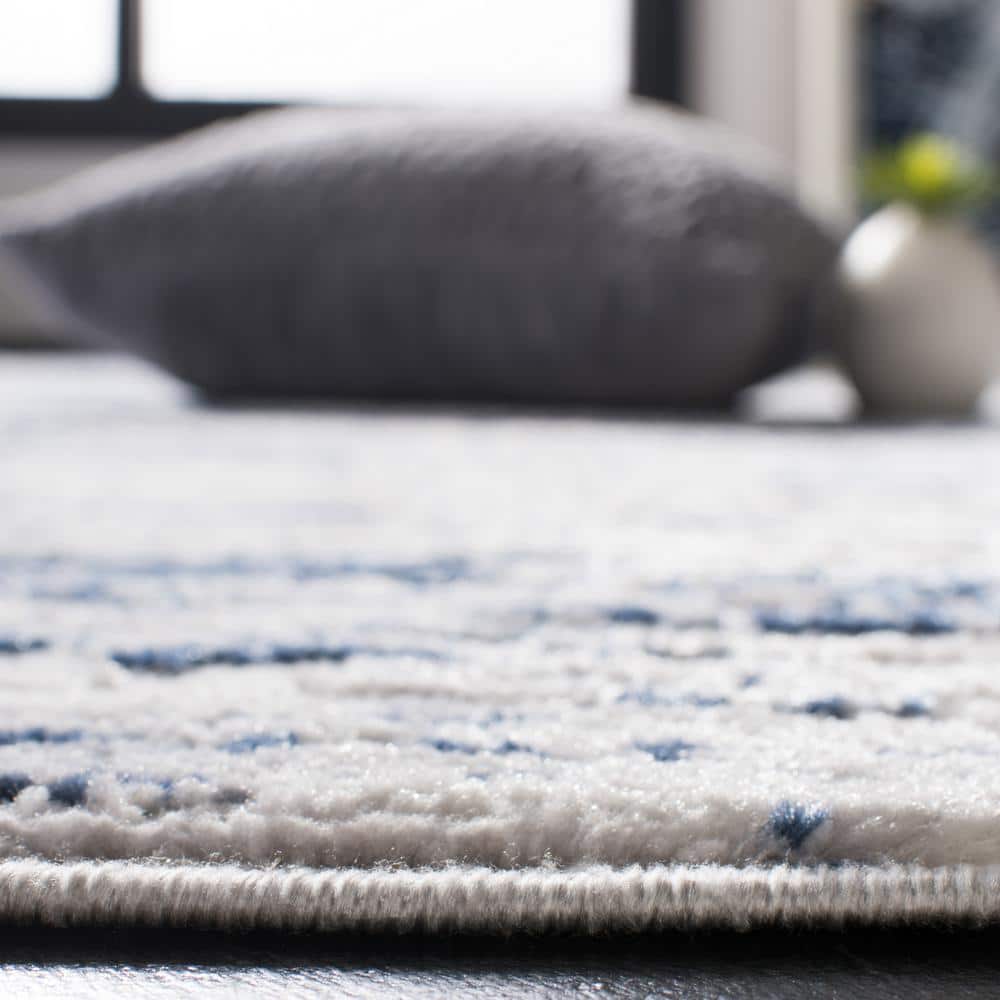 Amelia 8' Round Grey and Navy Abstract Synthetic Rug