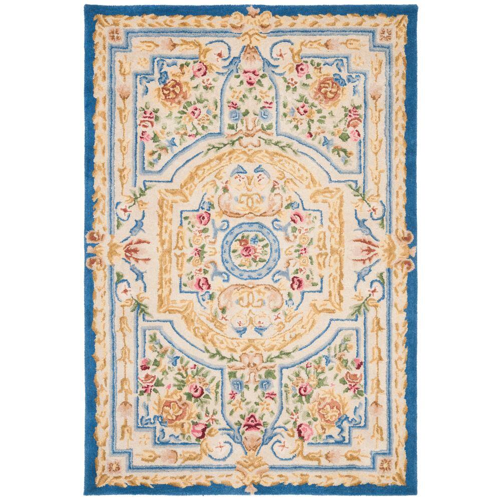 Handmade Blue and Ivory Wool 4' x 6' Tufted Area Rug