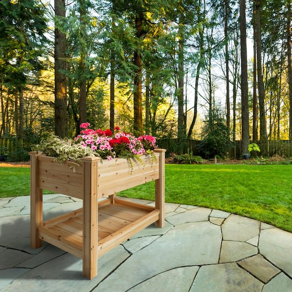 https://images.thdstatic.com/productImages/ef36846d-68d2-4bb7-b00a-9f9567430e2c/svn/natural-cedar-outdoor-essentials-elevated-garden-beds-472545-e1_600.jpg