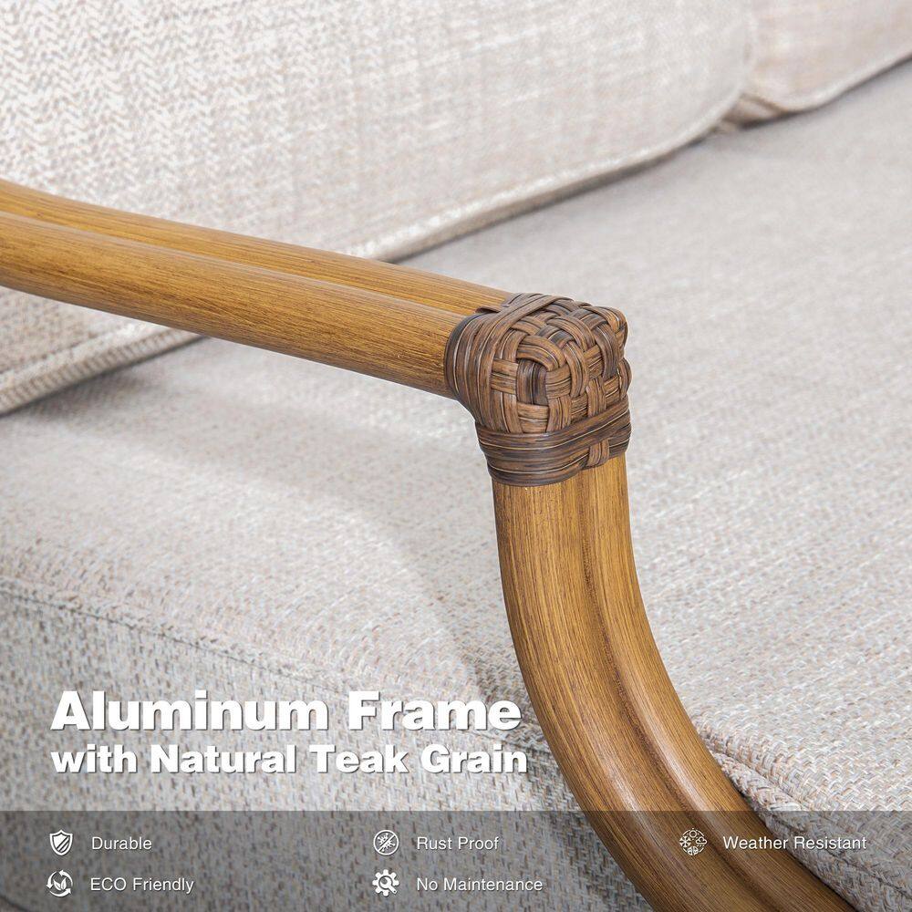 Close-up of the teak-grain aluminum frame and woven detail on the sofa arm.