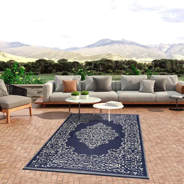 https://images.thdstatic.com/productImages/ef617de9-ff70-4e44-ad70-ab461339076a/svn/blue-white-beverly-rug-outdoor-rugs-hd-odr20746-4x6-e1_600.jpg